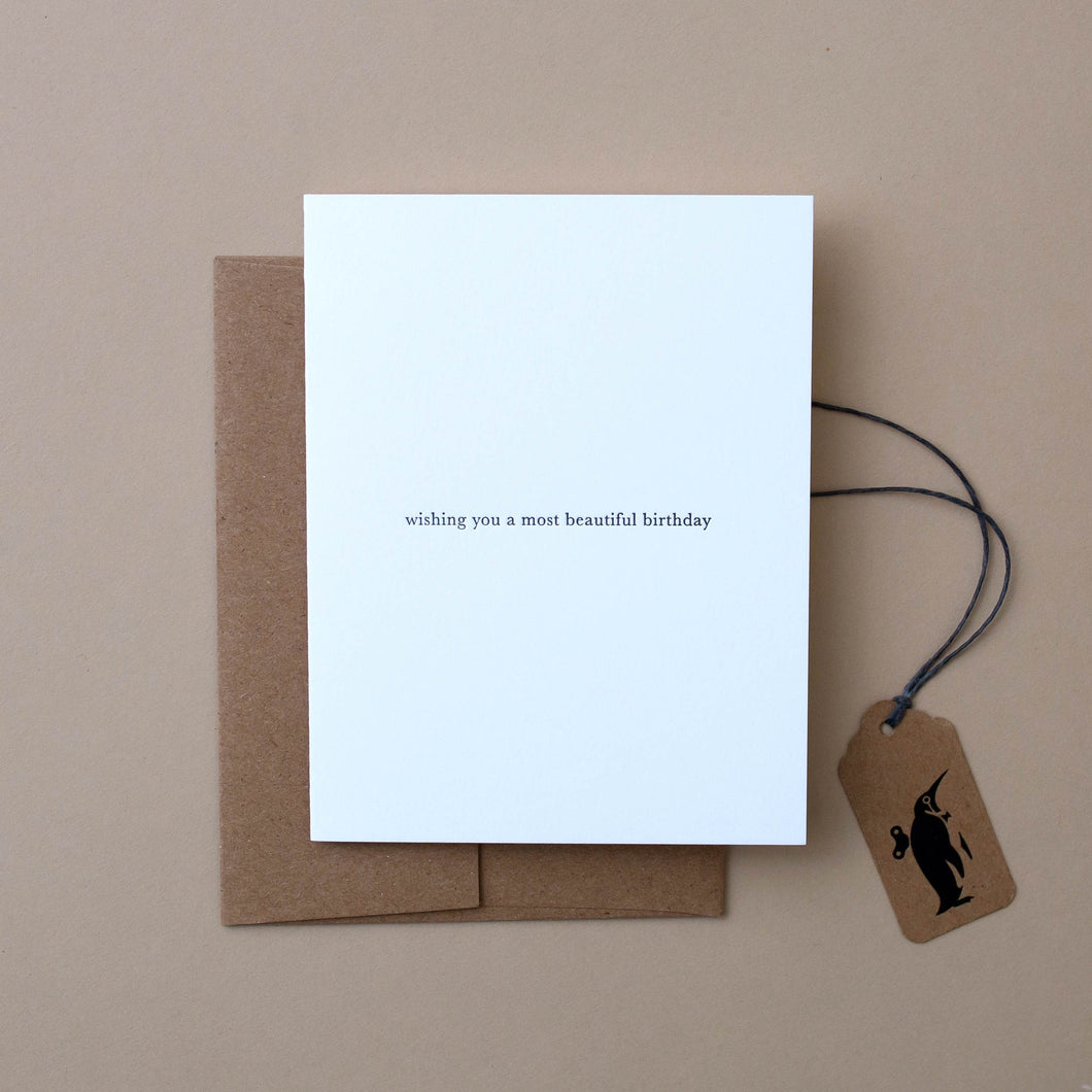 white-card-with-black-text-reading-wishing-you-a-most-beautiful-birthday