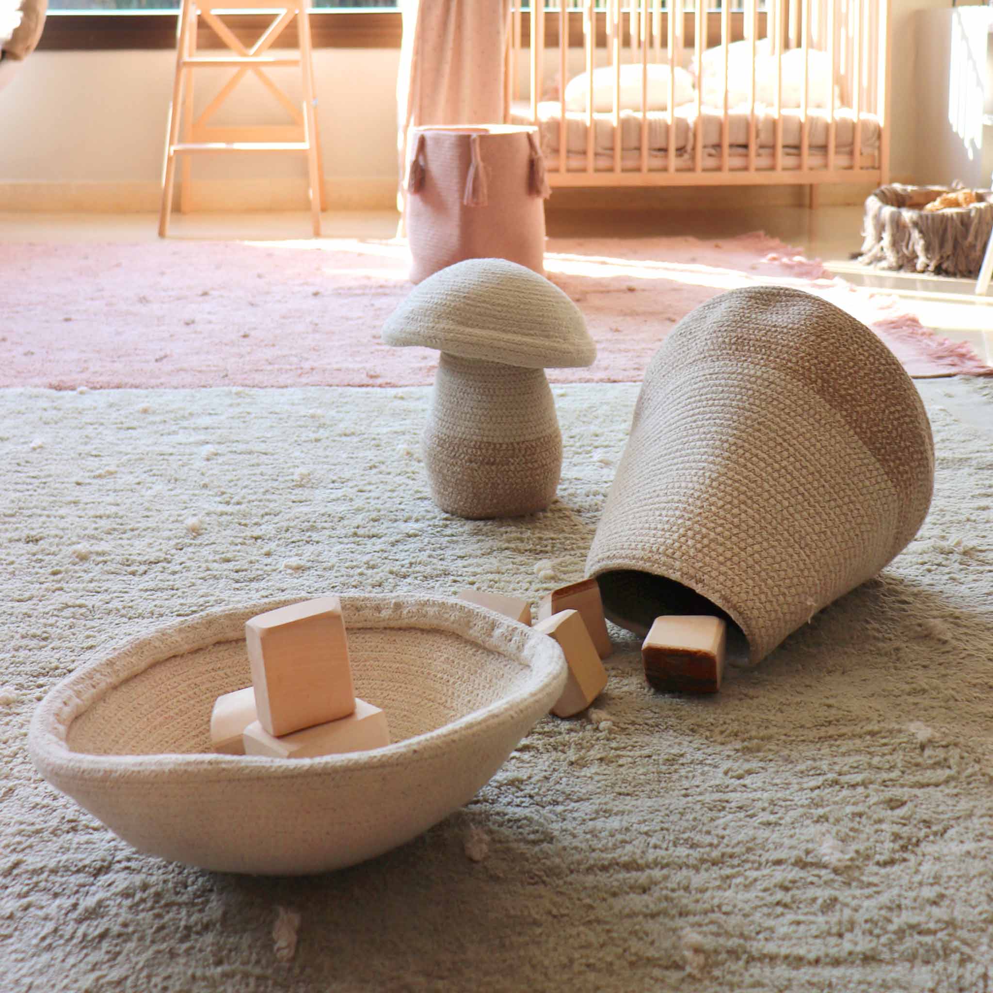 large-mushroom-basket-shown-open-on-its-side-filled-with-wooden-blocks