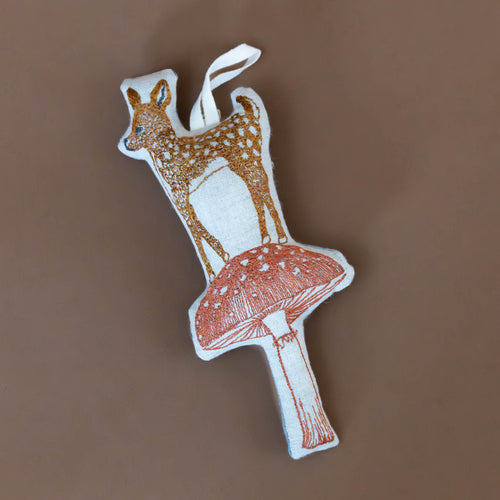 mushroom-deer-embroidered-ornament-with-a-brown-deer-atop-a-rust-colored-mushroom