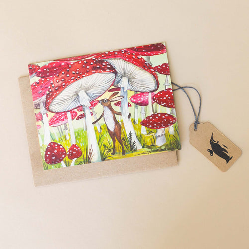 red-spotted-mushroom-garden-with-rabbit-greeting-card