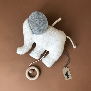 musical-elephant-toy-in-gray-felt-and-white-fuzzy-fabric-and-string-with-wooden-pully-that-plays-music-by-efie