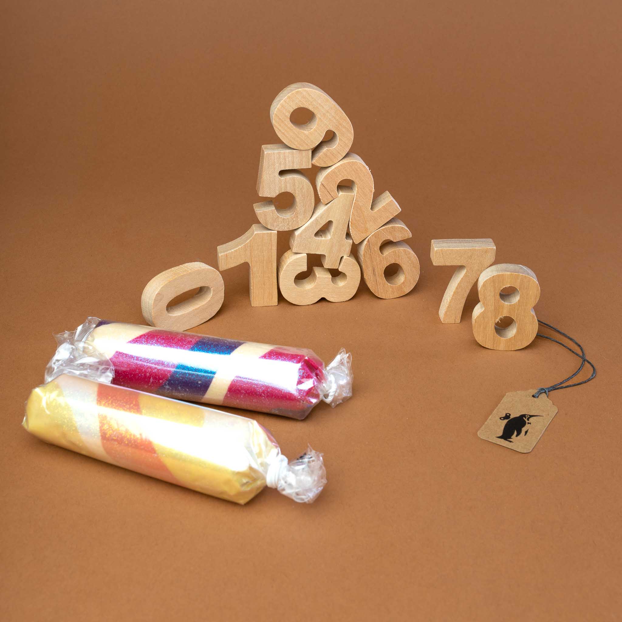 wooden-numbers-zero-to-nine-and-two-rolls-of-glitter-dough