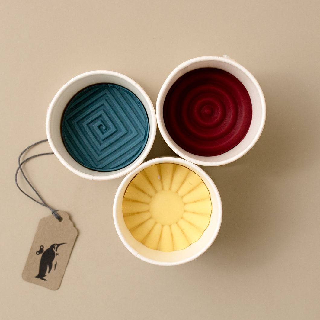red-blue-yellow-dough-containers-from-above