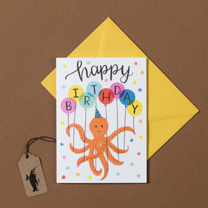 octopus-holding-balloons-that-spell-birthday-greeting-card-with-yellow-envelope
