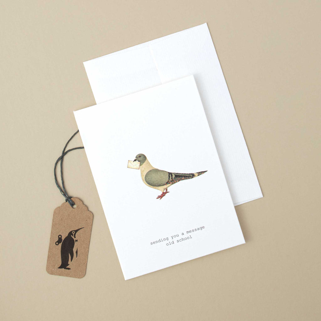 white-greeting-card-illustrated-pigeon-holding-letter-and-black-text-reading-sending-you-a-message-old-school
