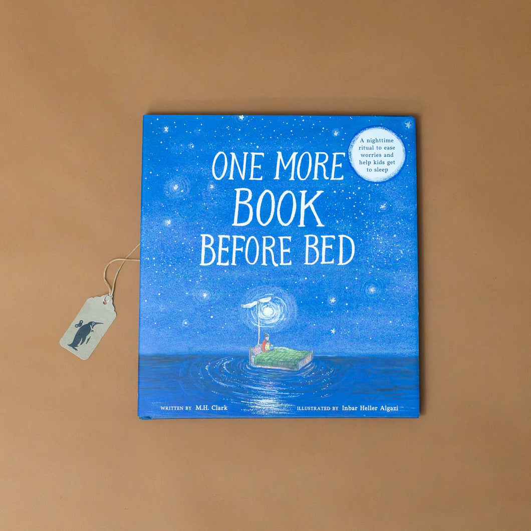 one-more-book-before-bed-book-blue-cover--with-a-parent-and-child-reading-a-book-in-bed-surrounded-by-stars-and-calm-sea