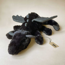 Load image into Gallery viewer, black-onyx-dragon-stuffed-animal-with-sparkle-wings-and-spines-in-laying-position