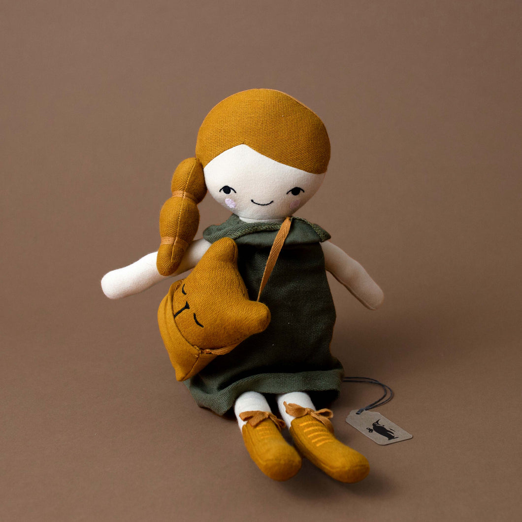 organic-cotton-doll-acor-wearing-green-dress-with-ochre-hair-boots-bag-and-small-bear-friend