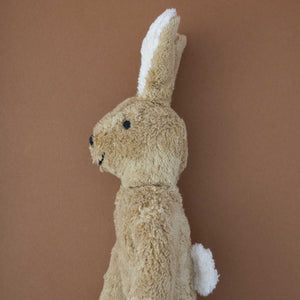 side-view-of-beige-rabbit-stuffed-animal