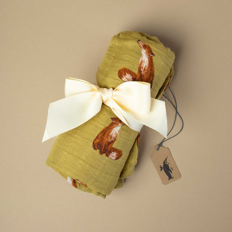 organic-cotton-swaddle-gold-fox-wrapped-in-a-bow