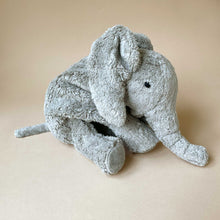 Load image into Gallery viewer, grey-organic-cotton-warming-elephant-sitting