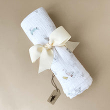 Load image into Gallery viewer, white-rolled-swaddle-with-pastel-woodland-pattern