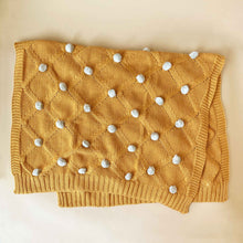 Load image into Gallery viewer, butterscoth-organic-knit-blanket-with-grey-pom-poms-unfolded