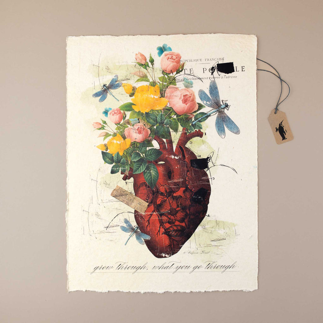 white-handmade-paper-with-illustration-of-human-heart-holding-flowers