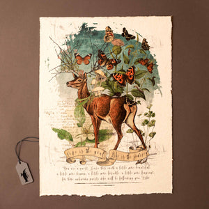 deer-with-branch-antlers-and-butterfly-garden-growing-from-back-above-quote-ribbon