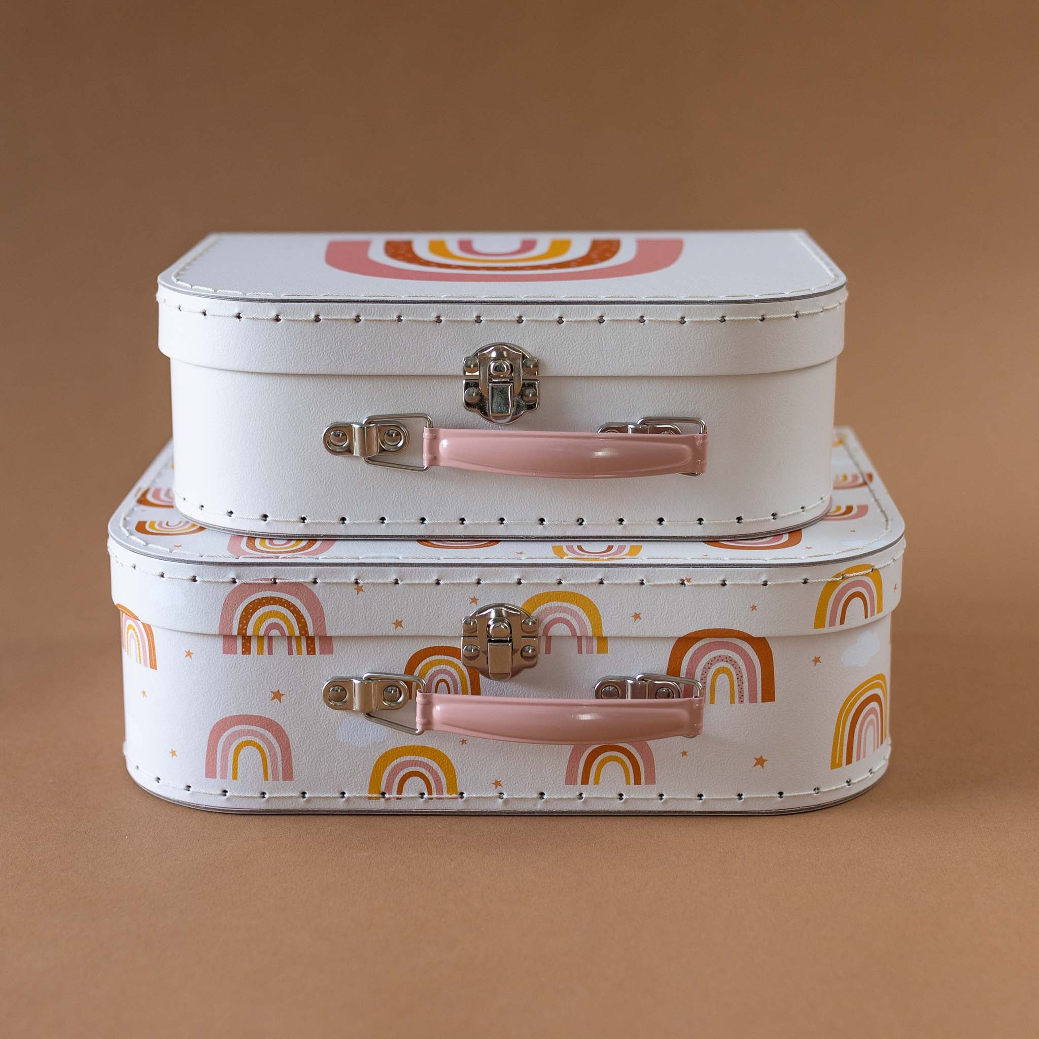 two-sizes-rainbow-suittcases-stacked