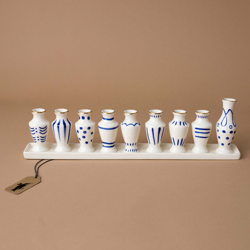 Petit-Ceramic-Menorah-white-with-blue-and-gold-accent