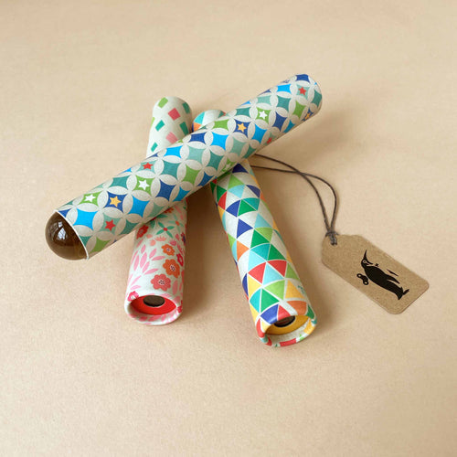 petite-kaleidoscope-patterned-colorful-cylinders