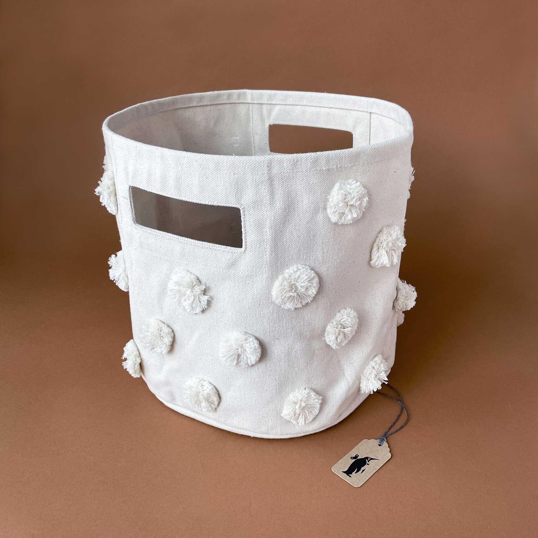 canvas-storage-bin-with-canvas-colored-pom-poms