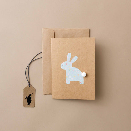 natural-greeting-card-with-blue-floral-bunny-and-white-pom-tail