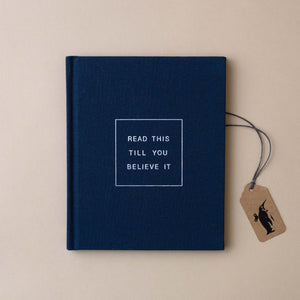 blue-linen-cover-with-read-this-till-you-believe-it-in-white-text