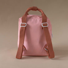 Load image into Gallery viewer, back-view-blush-backpack-and-red-straps