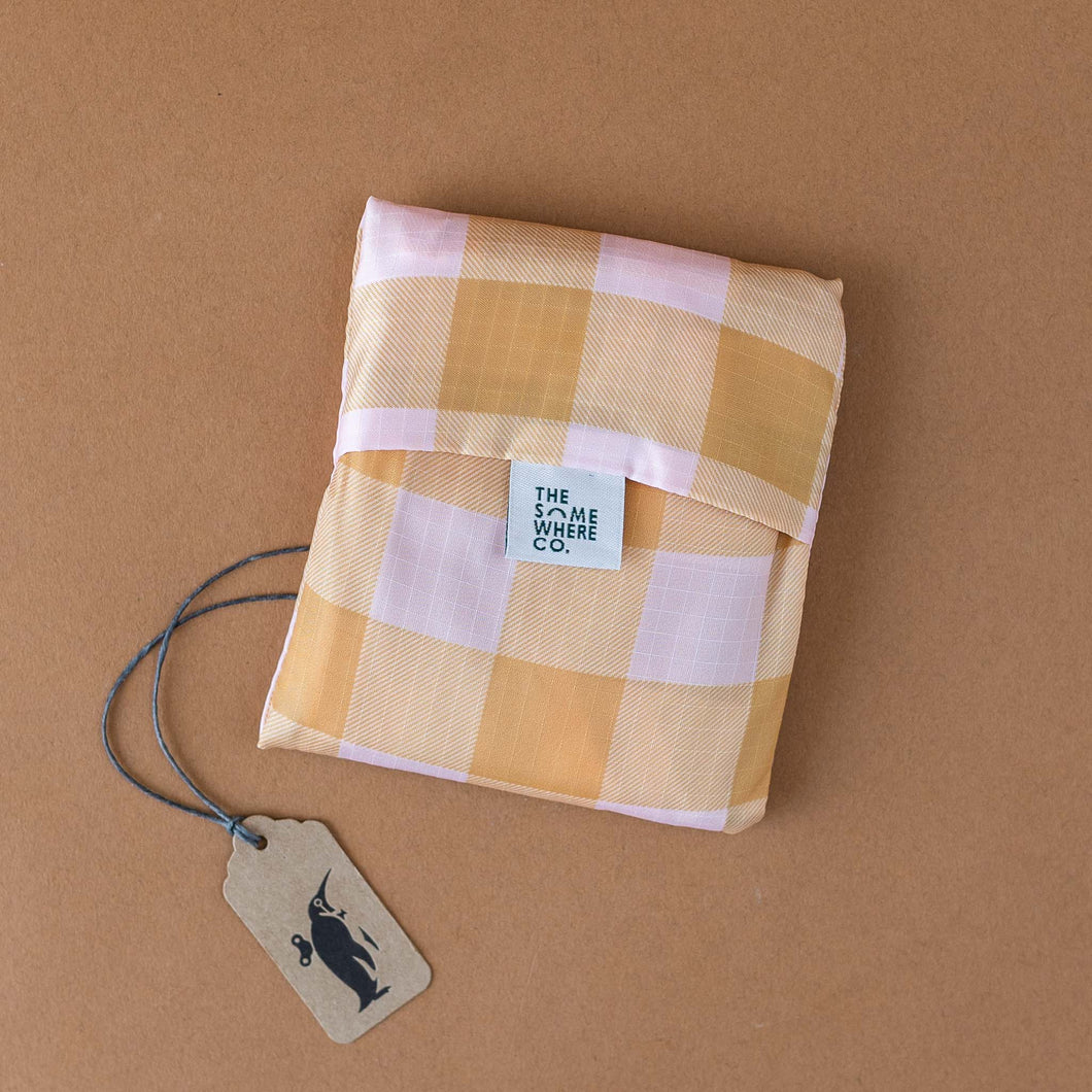 orange-and-pink-gingham-bag-folded-in-pouch