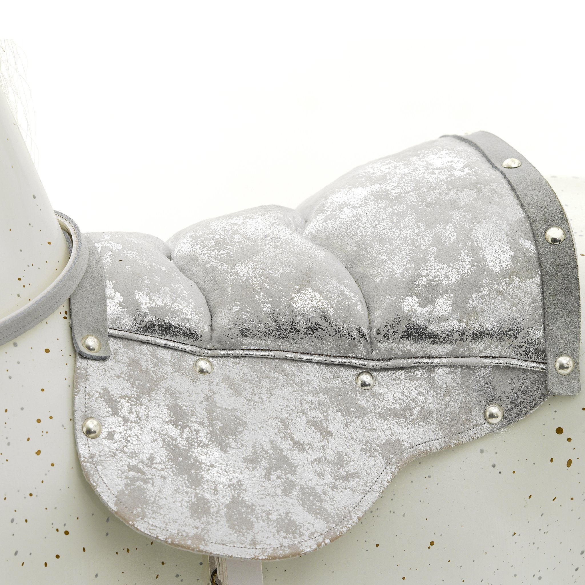 close-up-silver-saddle-on-white-unicorn