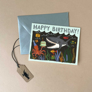 colorful-happy-birthday-card-with-shark-octopus-cake-and-silver-envelope