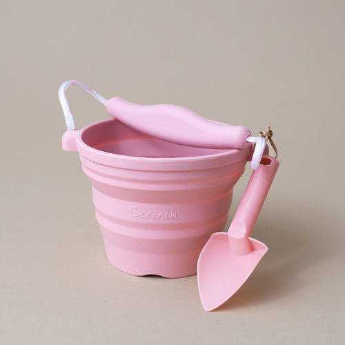 light-pink-plant-pot-with-spade
