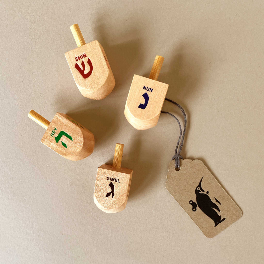 small-natural-dreidel-with-multi-color-hewbrew-letters
