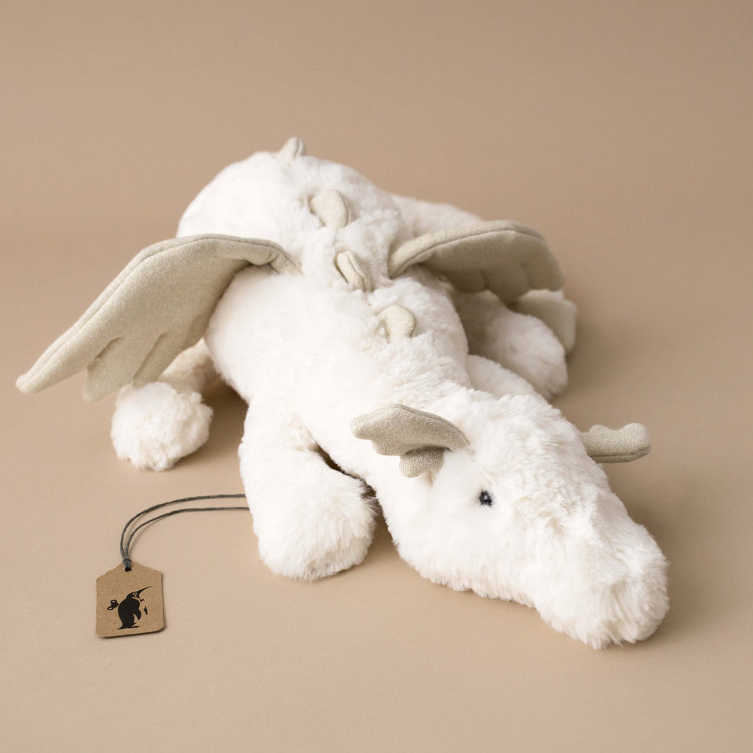 white-snow-dragon-stuffed-animal-with-sparkle-wings-and-spines-in-laying-position