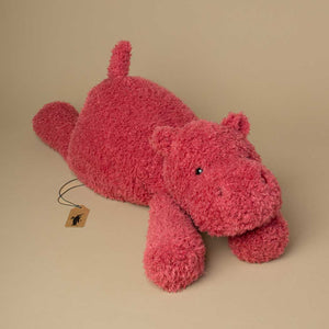 fluffy-red-hippo-laying-flat