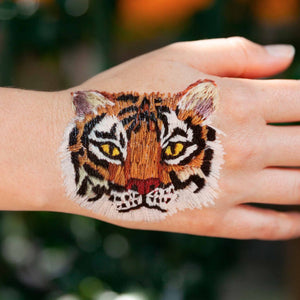 stitched-tiger-temporary-tattoo-on-light-skinned-model