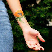 Load image into Gallery viewer, sunflower-temporary-tattoo-on-light-skinned-model