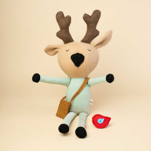 deer-stuffie-sitting-with-red-bird-on-his-right