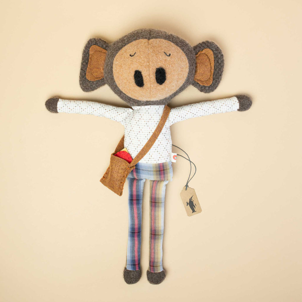 monkey-stuffie-in-dot-shirt-and-plaid-pants-with-brown-bag-and-red-bird