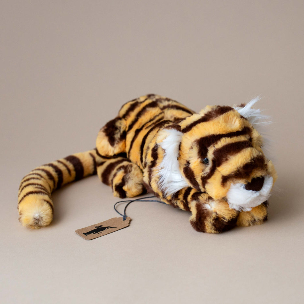 small-tiger-stuffed-animal-in-laying-position