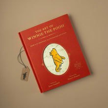 Load image into Gallery viewer,     the-art-of-winnie-the-pooh-book-red-cover-with-pooh