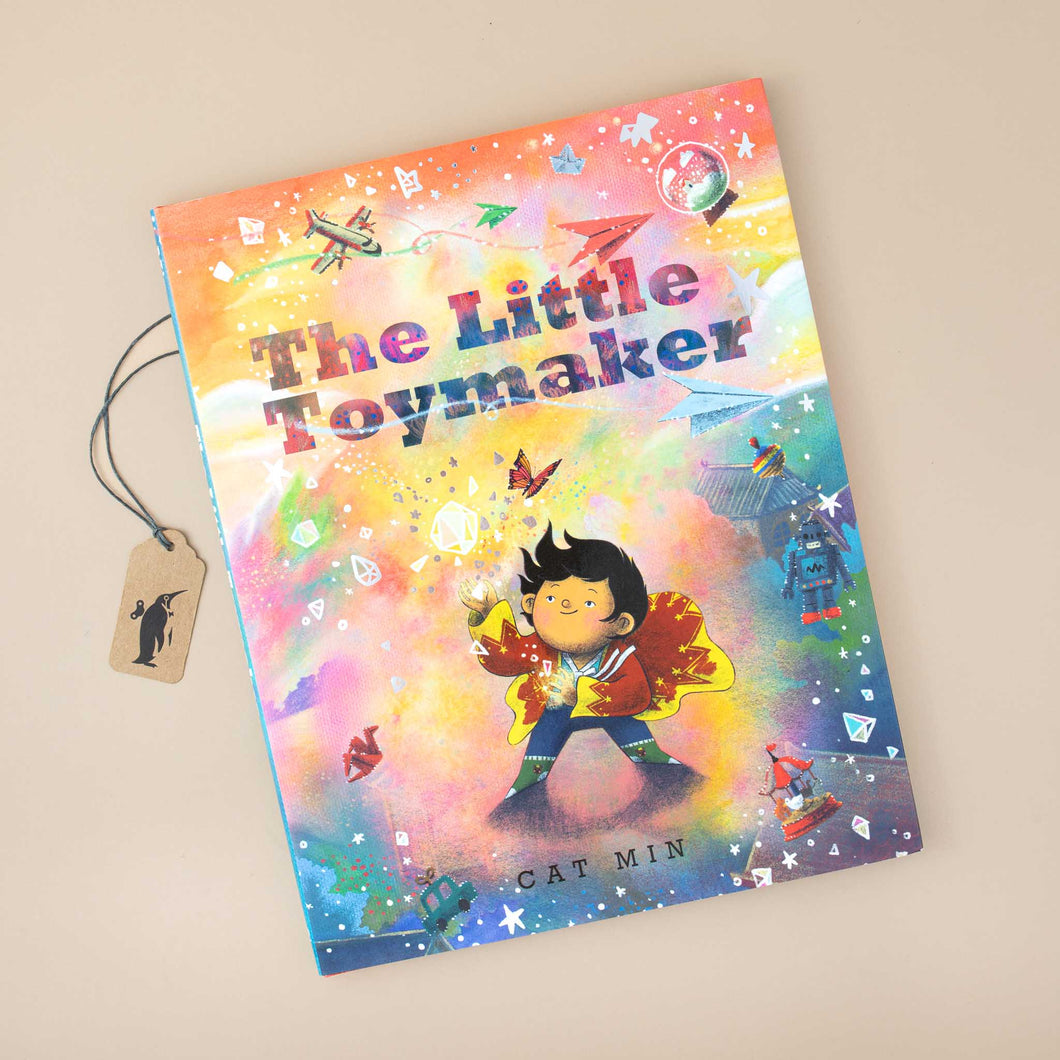 front-cover-little-toymaker-book-with-watercolor-style-background-illustration