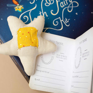 close-up-star-pillow-and-journal