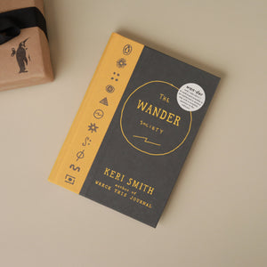 front-cover-the-wander-society-book-grey-and-yellow-with-yellow-text