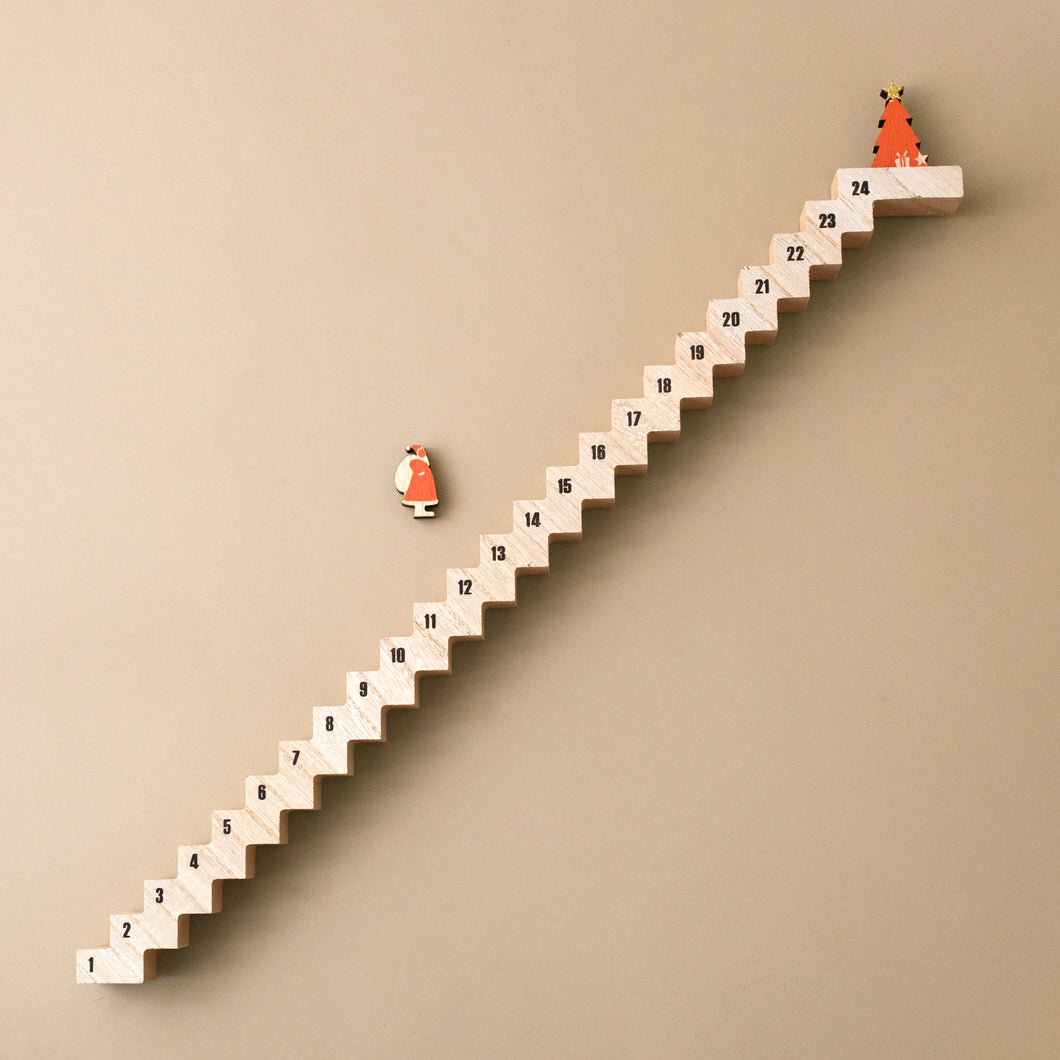 father-christmas-traveling-advent-calendar-numbered-stairs-with-tree-at-top