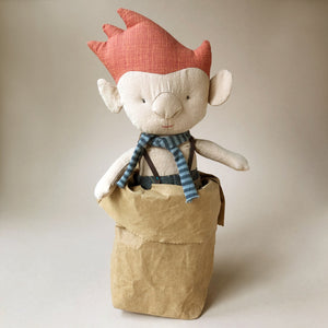 troll-in-bag-blue-scarf-with-red-hair-and-a-big-nose