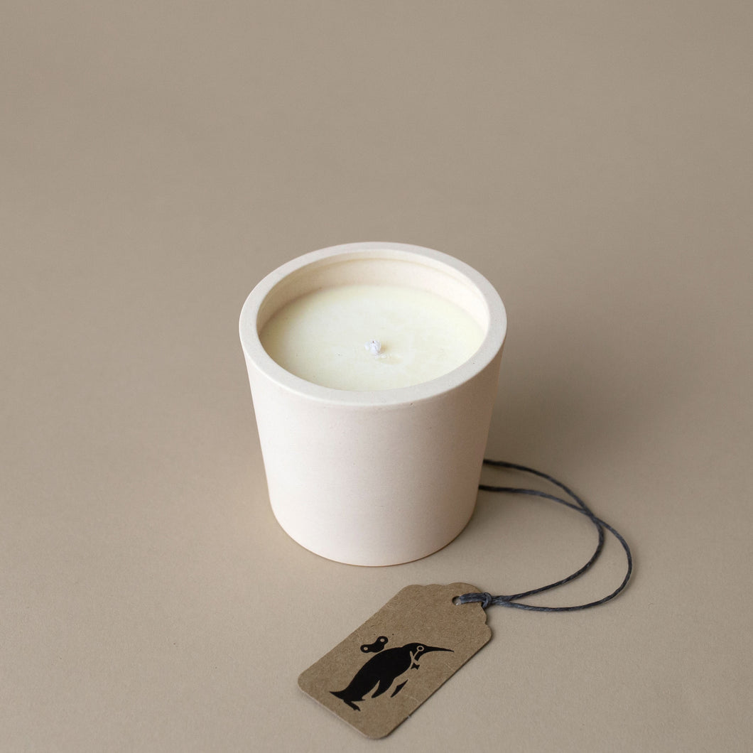 white-candle-in-white-container