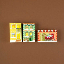 Load image into Gallery viewer, yellow-green-and-red-matchstick-houses-with-christmas-details