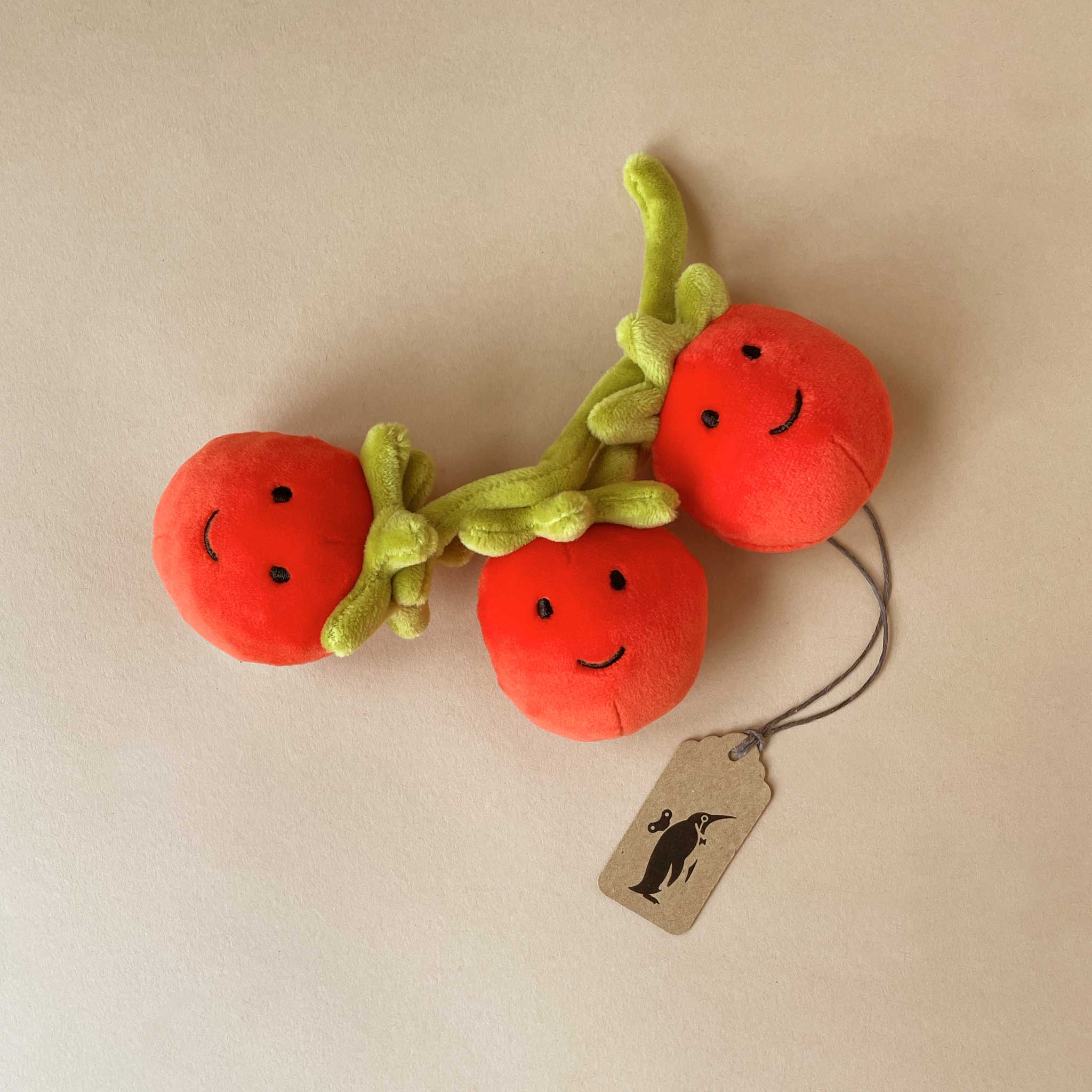 viviacios-veggie-tomato-stuffed-animal-on-vine-with-smiling-faces