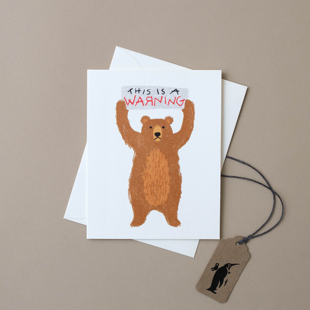 bear-holding-sign-this-is-a-warning