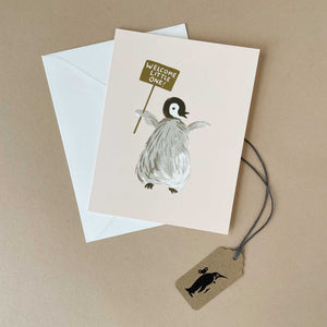 illustrated-penguin-holding-welcome-little-one-sign-greeting-card-with-white-envelope