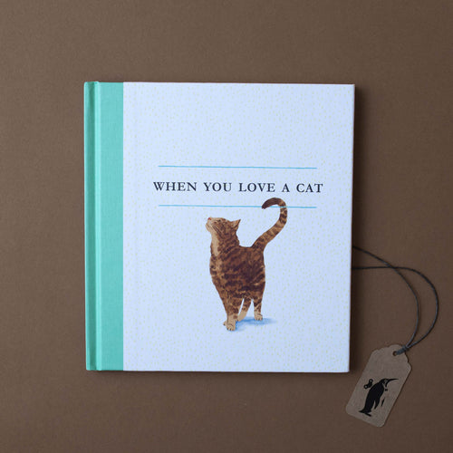 when-you-love-a-cat-book-front-white-cover-with-green-spine-and-cat-on-front